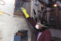 Cleaning while wearing N-95 respiratory, gloves and goggles
